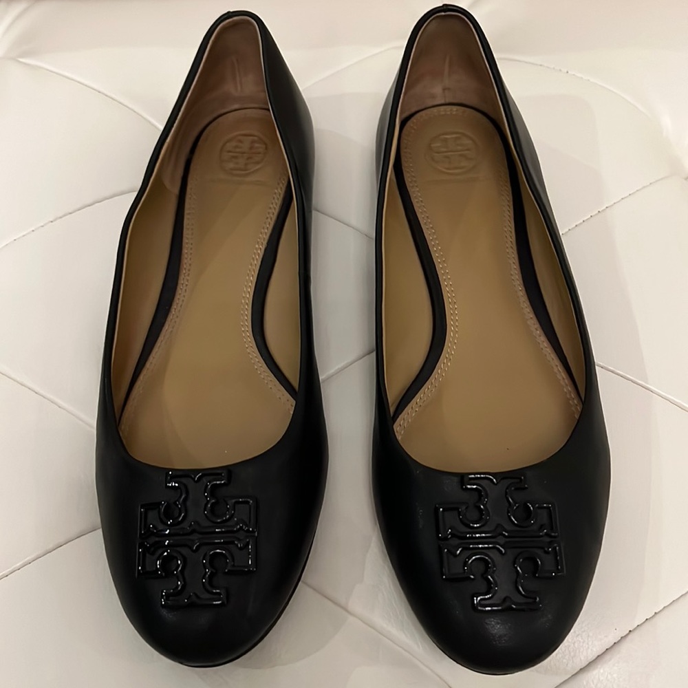 Tory Burch black leather flats.